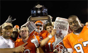 Football team holding trophy