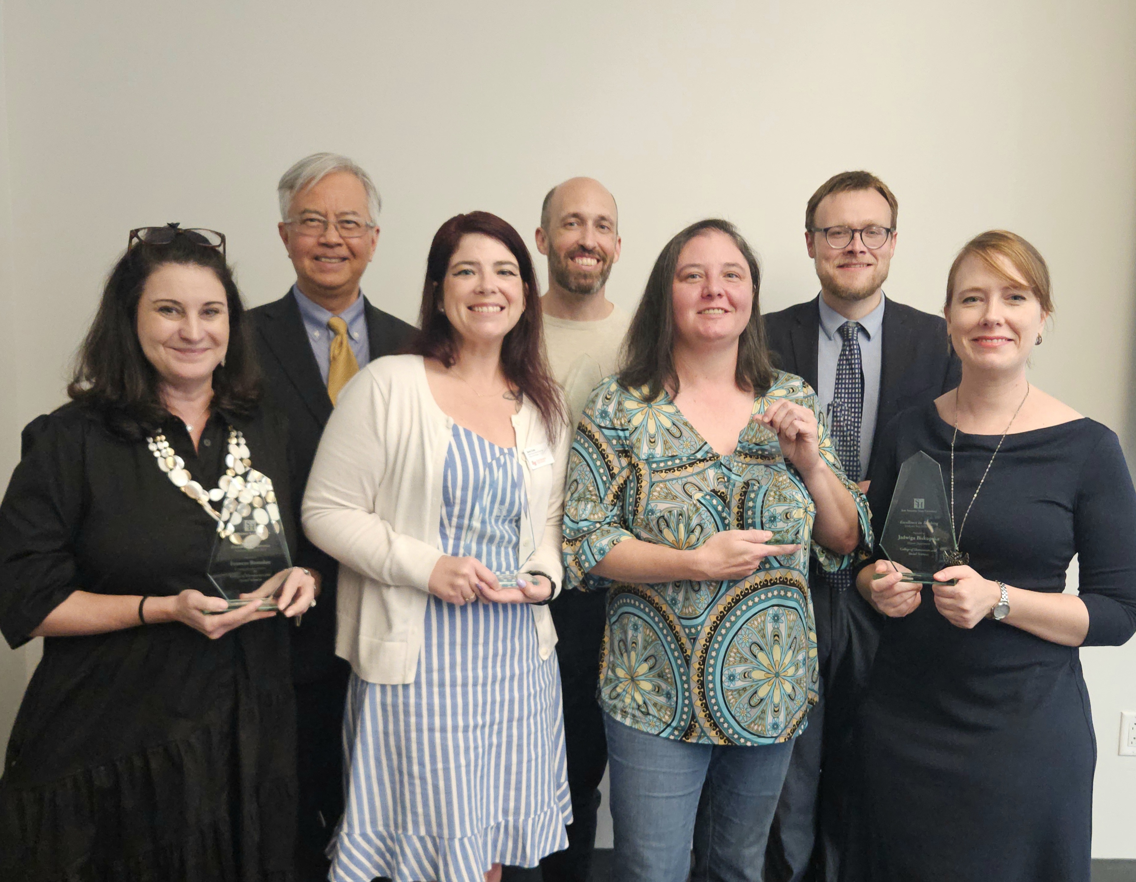 CHSS Annual Awards 2023: Back: Dean Chien Pin Li, Dr. Ben Park, Dr. Brian Jordan, Front: Dr. Frances Brandau, Sarie Fuller, Dr. Jennifer Child, Dr. Jadwiga Biskupska