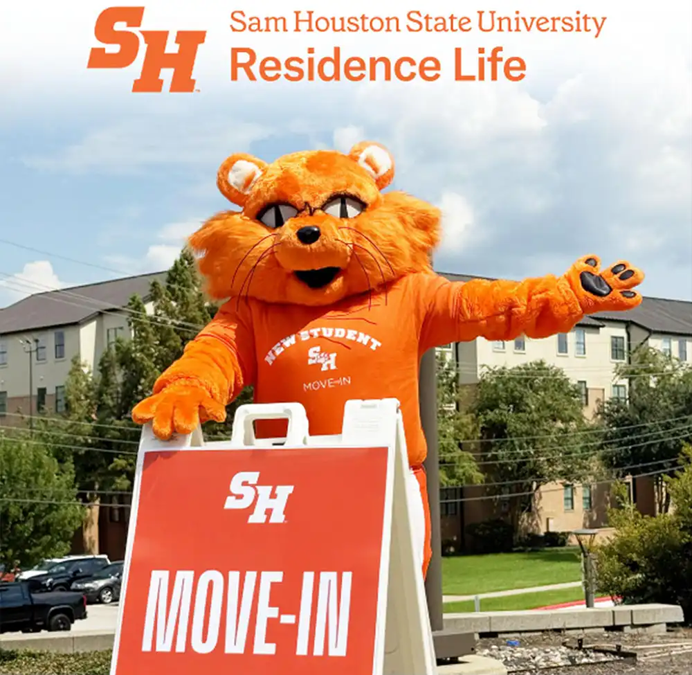 Sammy with move in sign