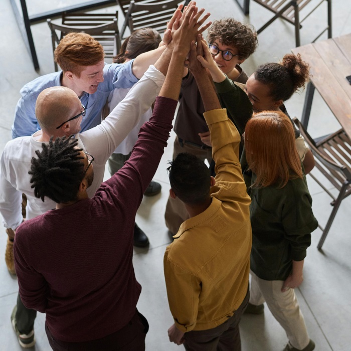 Group of people celebrating together. 