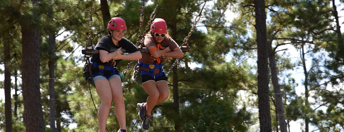 Campers on giant swing