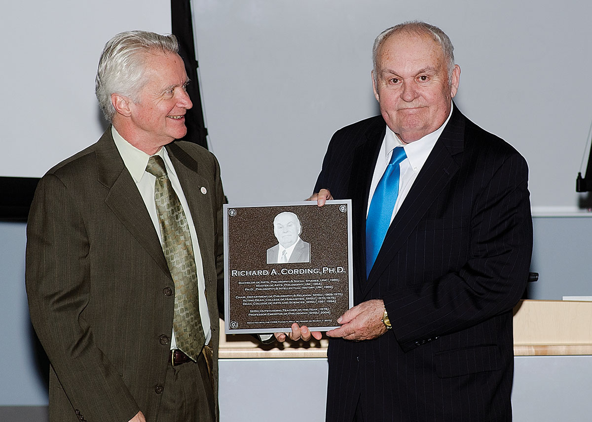 Richard Cording accepting his Wall of Honor plaque.