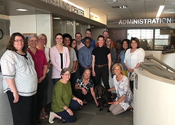 The staff of the Counseling Center pose in their office.