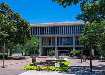 A view of the Newton Gresham Library from the interior of the S.H.S.U. campus.