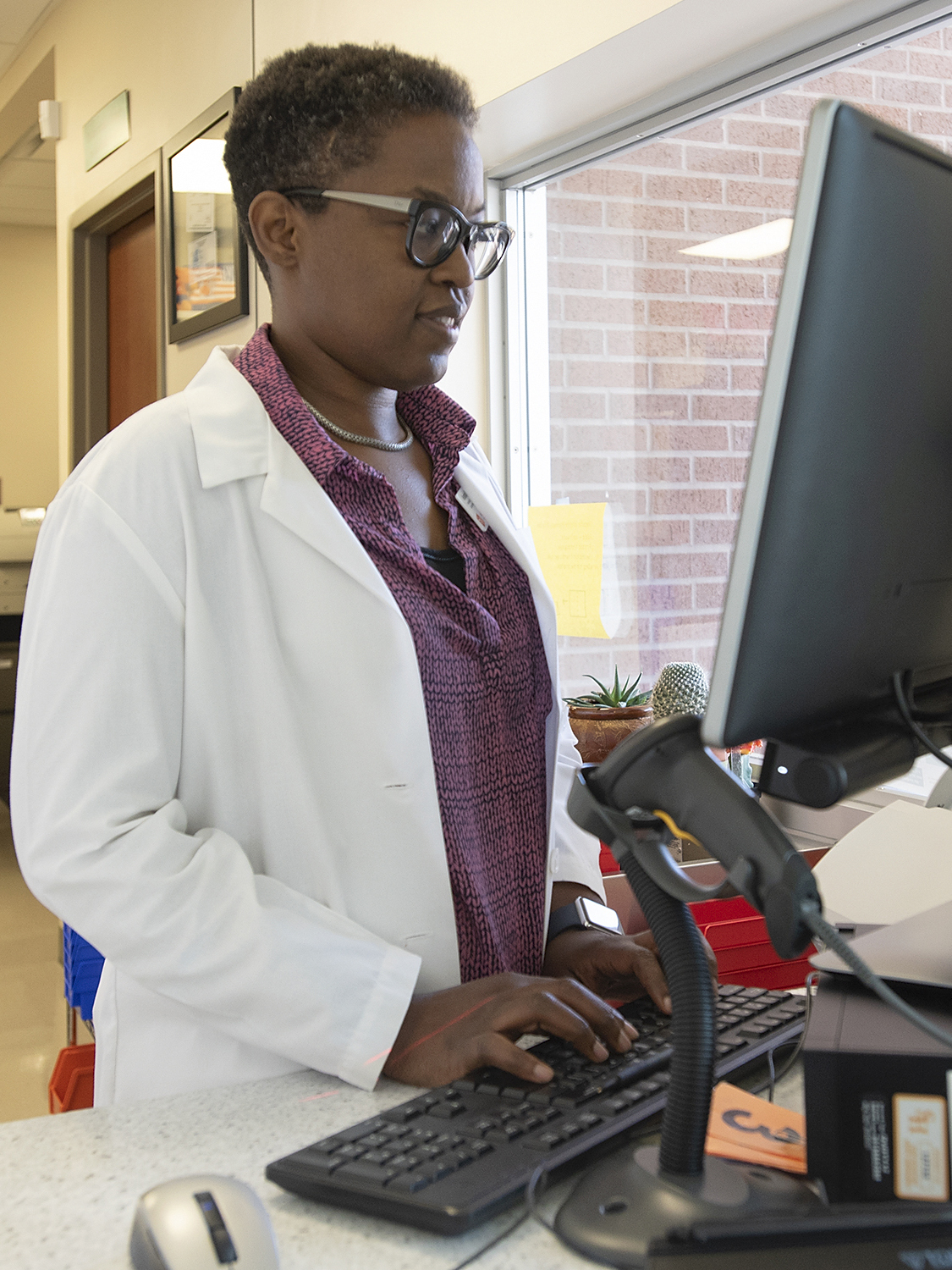 Pharmacist at Computer