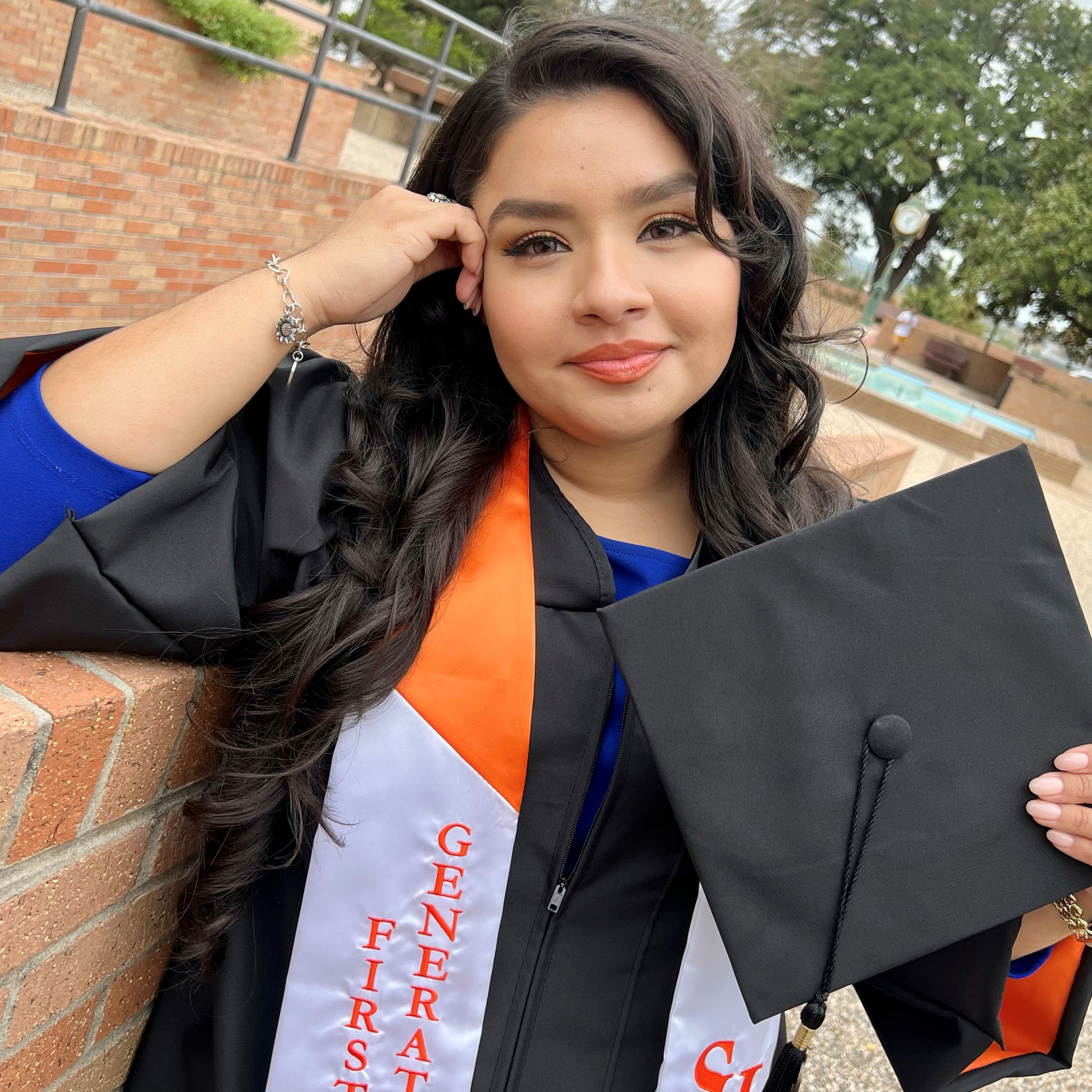 Vasty Nazario in cap and gown